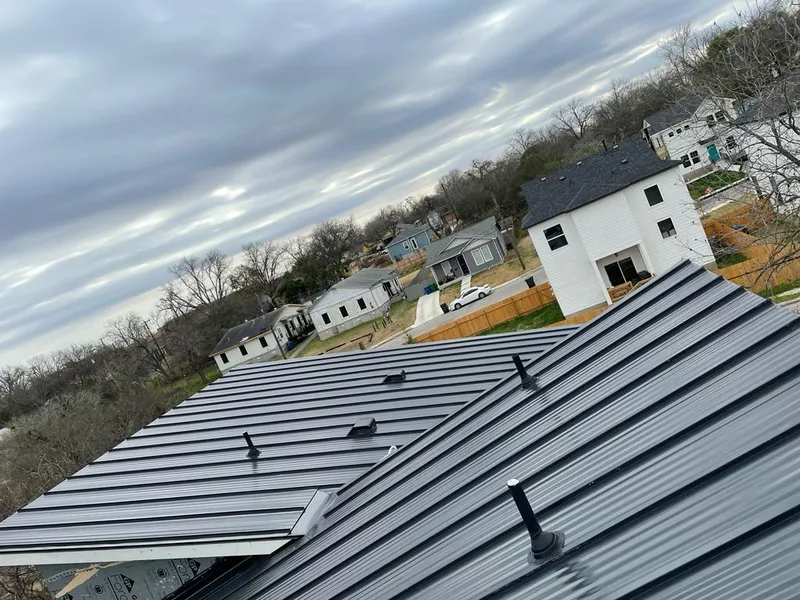 Standing seam metal roof panels with vents for Skylight Repair in Knoxville